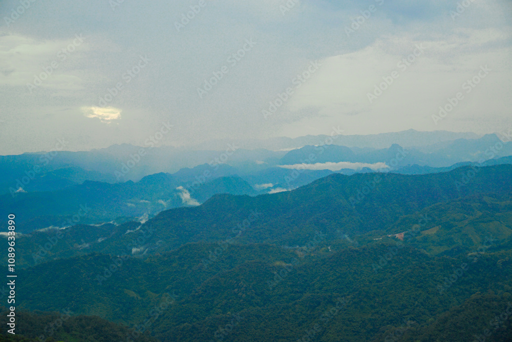 Breathtaking scenic view of mountain ranges remote location nature photography overcast skies panoramic perspective serenity Breathtaking scenic view of mountain ranges remote location nature photography overcast skies panoramic perspective serenity