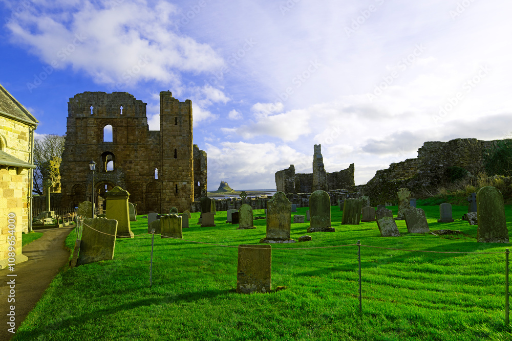 View of Lindisfarne Priory and Castle from St Mary's Church yard. View of Lindisfarne Priory and Castle from St Mary's Church yard.