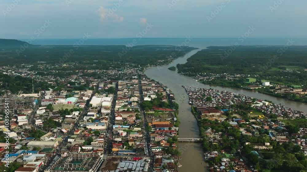 Drone survey of Cotabato City with river, the independent city in Mindanao, Philippines. Drone survey of Cotabato City with river, the independent city in Mindanao, Philippines.