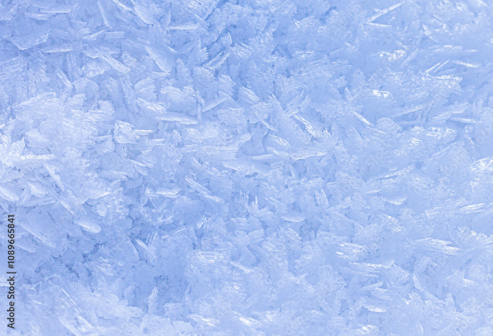 Frosty crystal texture close-up. Ice crystals and frozen patterns. Blue tones background. Concept winter beauty Frosty crystal texture close-up. Ice crystals and frozen patterns. Blue tones background. Concept winter beauty