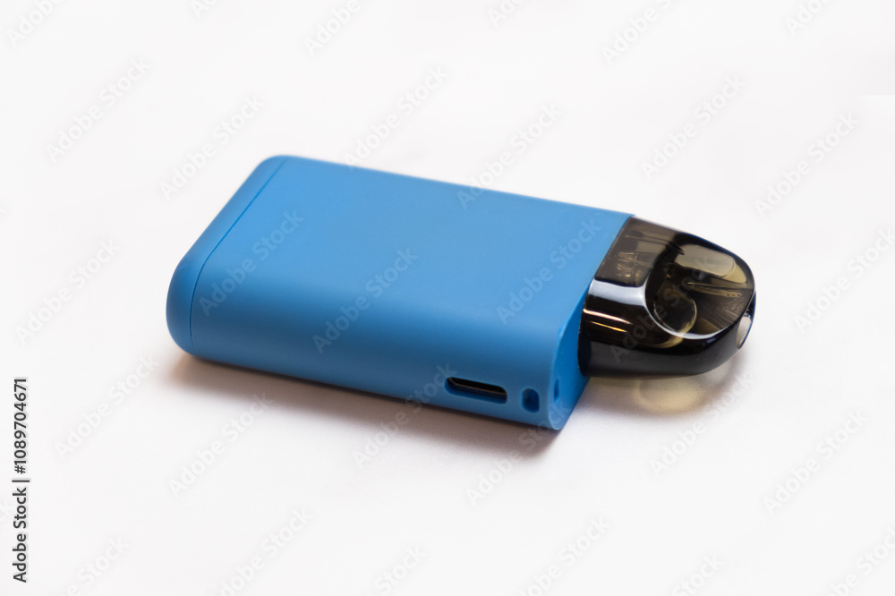 POD-system for smoking on a light background. A device with a ...