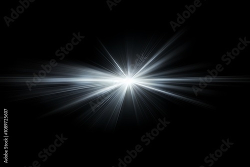 Subtle radial light effect in silver over a black background