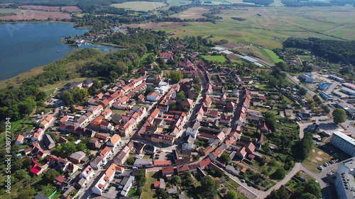 Aerial around the old town of the city of Wesenberg, Germany on a sunny day in autumn	 photo