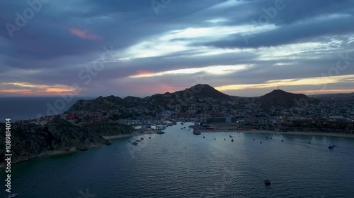 Sunset Timelapse in Cabo San Lucas Baja California Sur Mexico Marina. Boats Returning for the Evening photo