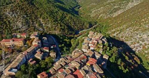 Aerial view of the mountain town of Cansano in the Maiella National Park.In the background the mountain ranges of Monte Morrone and Gran Sasso.Abruzzo photo