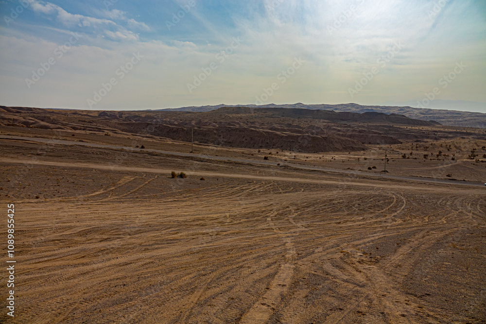 Obraz premium Unroad transport as a scourge of nature. The desert has literally been traversed by motorists who drive off-road in jeeps, trampling down. Iran