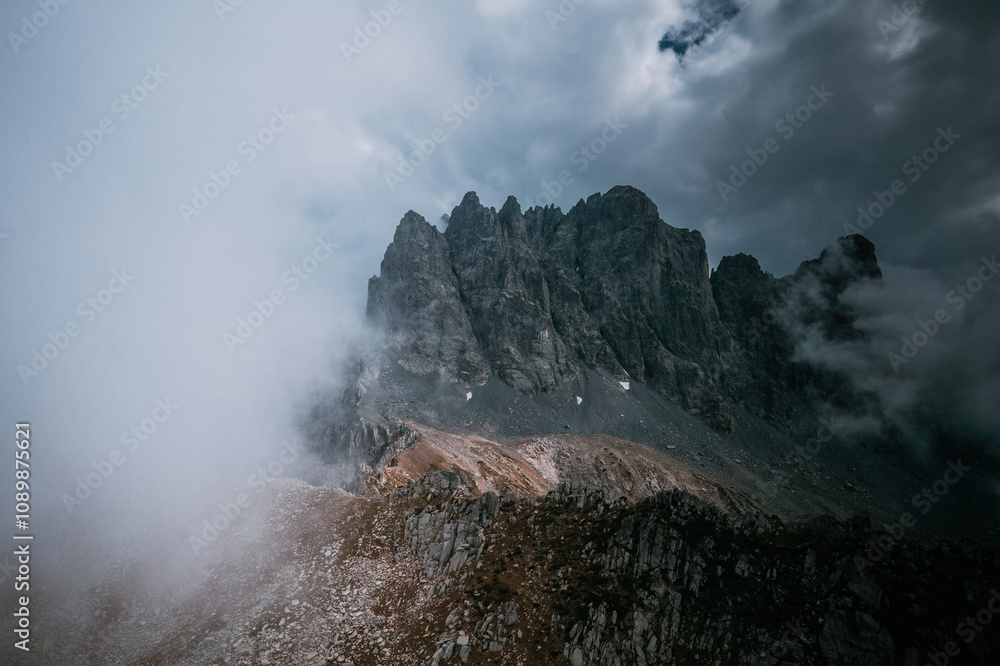 Fototapeta premium Kackar, Altiparmak mountains.High mountain in fog and clouds in the early morning.Gloomy mountain landscape with fog and mist.Rize, Turkey.