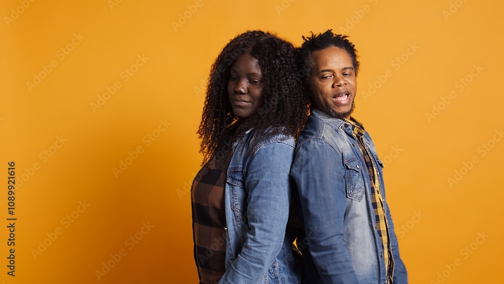 Fototapeta premium Furious offended couple having an argument and screaming at each other, dealing with marriage difficulties and misunderstandings. Annoyed frustrated man and woman quarreling. Camera B.