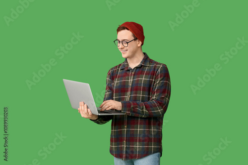 Young man in hat and with l...
