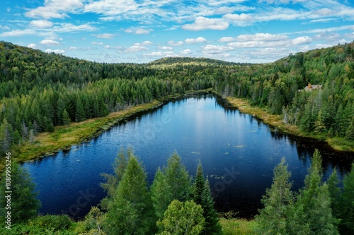 Small lake in the forest. Sainte-Lucie-des-Laurentides, Val David, Quebec, Canada. photo