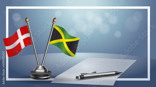 Denmark and Jamaica National flags on small table with bokeh background, cooperative relationship