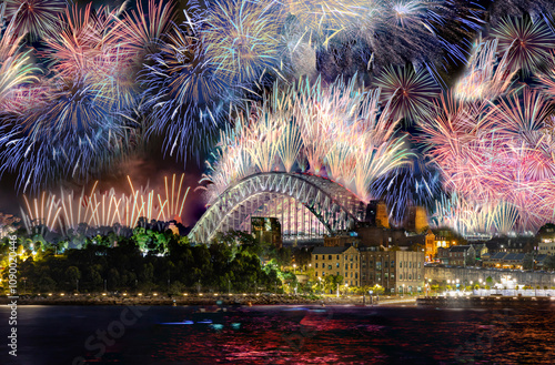 Photography Sydney Harbour Bridge New Years Eve fireworks, colourful NYE fire works lighting the night skies with vivid multi colours NSW Australia