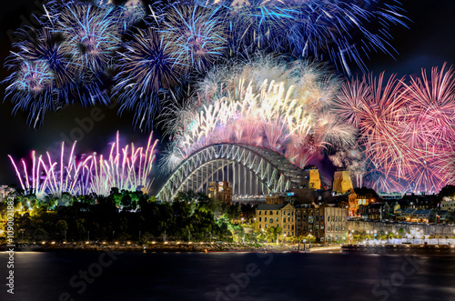 Canvas Print Sydney Harbour Bridge New Years Eve fireworks, colourful NYE fire works lighting the night skies with vivid multi colours NSW Australia