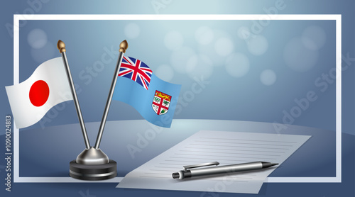 Japan and Fiji Small national flag on bokeh background, cooperative relationship