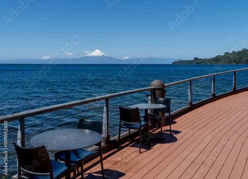 Obraz na płótnie A picturesque view from the terrace of Teatro del Lago in Frutillar, Chile, overlooking the serene Llanquihue Lake and the distant Andes mountains. w salonie