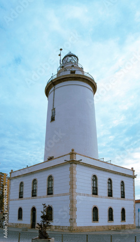 La Farola lighthouse in Malaga Spain, it's 21.64 meters or 71 feet high constructed in 1816.  photo