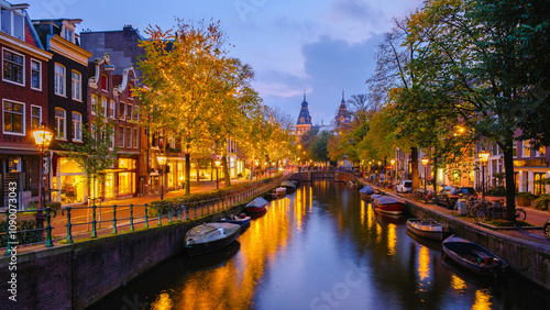 Photography Autumn evenings in Amsterdam with reflections on the serene canals and golden-li