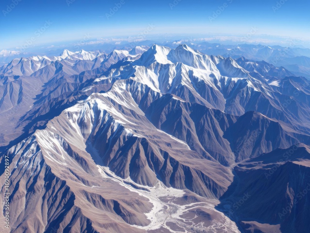 Obraz premium Aerial view of the Himalayan mountain range in Asia, showcasing its breathtaking peaks and snow-covered landscapes, terrain, rugged