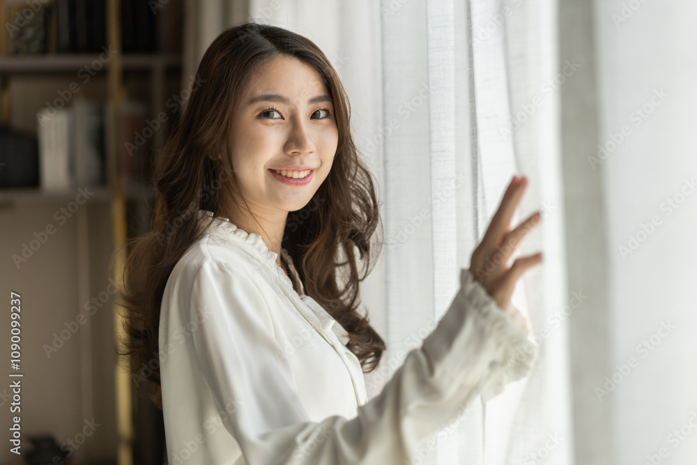 Beautiful young asian woman looking out window with a fresh and happy expression, serene mood, peaceful morning, joyful and relaxed, bright sunlight, cheerful atmosphere, optimistic and vibrant moment Beautiful young asian woman looking out window with a fresh and happy expression, serene mood, peaceful morning, joyful and relaxed, bright sunlight, cheerful atmosphere, optimistic and vibrant moment