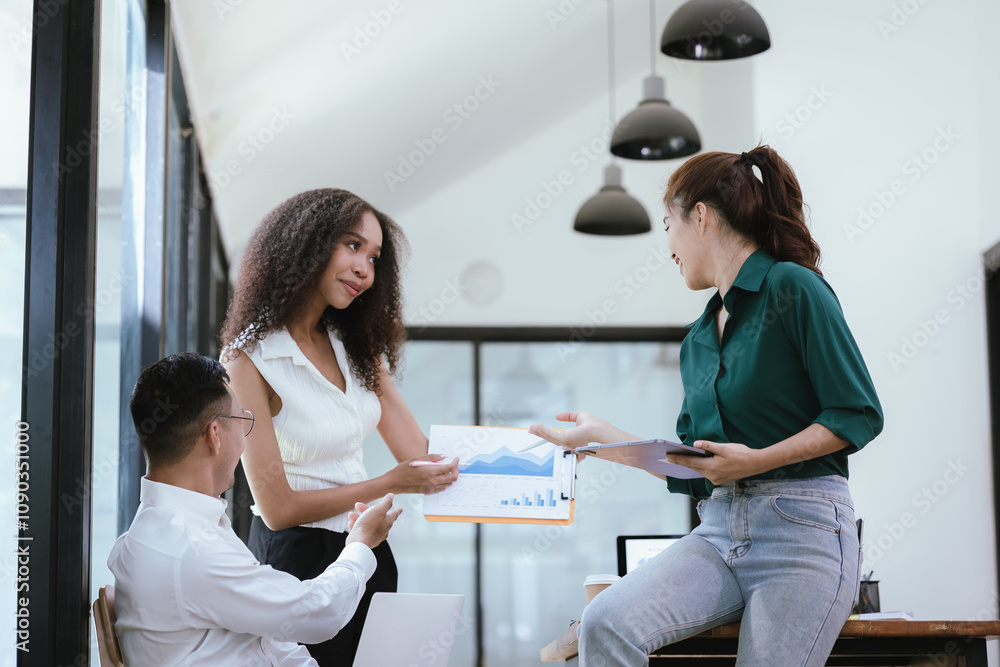 A team of professionals gathers in a modern office for a corporate meeting to analyze financial reports and charts, investments, and business project successes. A team of professionals gathers in a modern office for a corporate meeting to analyze financial reports and charts, investments, and business project successes.