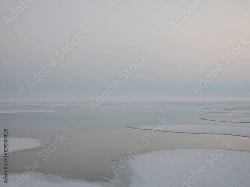 Vast Salt Flats Covered in Haze and Reflection. photo