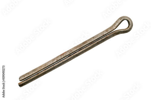 An old iron cotter pin on a white background. A close-up of a rusty cotter pin. photo