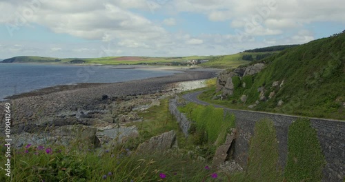 Extra Wide shot of Auchenmalg Bay with the A747 road photo