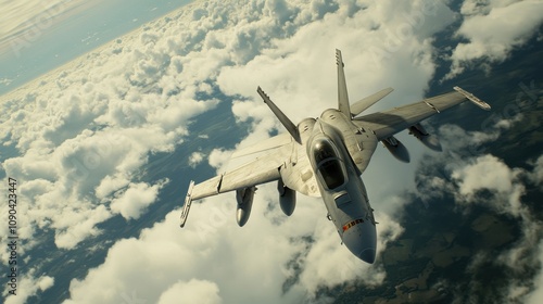 Military Jet Soaring Above Clouds in Bright Blue Sky, Capturing the Power and Precision of Modern Aviation Technology in Action photo