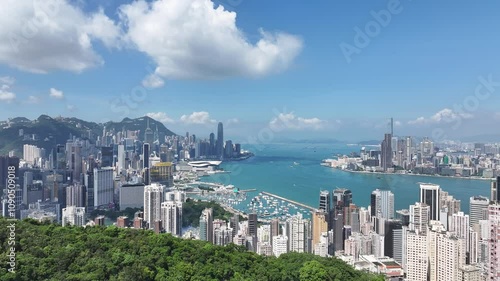 Aerial drone skyview of Hong Kong Kowloon Victoria Harbour Financial Tsim Sha Tsui Hung Hom Central Admiralty Wan Chai Happy Valley Causeway Bay Tai Hang Fortress Hill and North Point photo