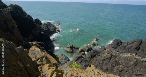 Wide shot Looking down on to rocks at Dunskey Street carpark at Portpatrick. photo