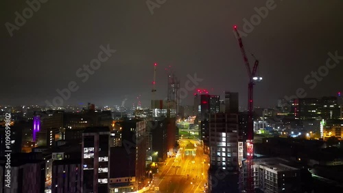 Wallpaper Mural Aerial Footage of Downtown Buildings at Central Birmingham City of Midlands, England, United Kingdom. Drone Camera Footage was Captured from High Altitude During Night of November 4th, 2024. Torontodigital.ca