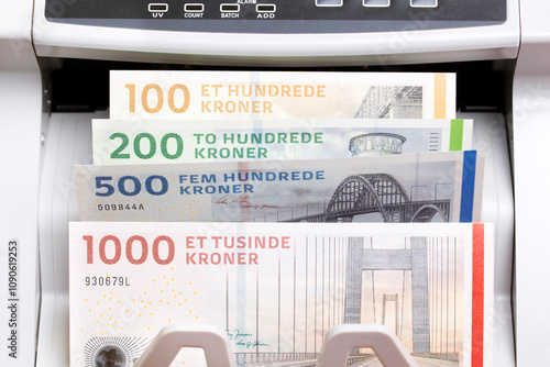 Danish krone in the counting machine photo