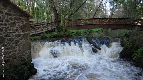 Molino de Gabenlle - Gabenlle Mill And Bridge Over The Anllons River In Laracha, Spain. photo