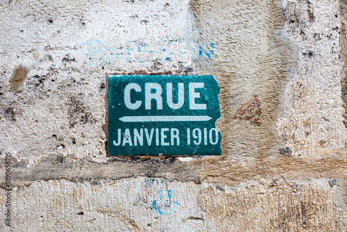 Ceramic plate on stone wall