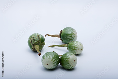Photo of fresh fruit or vegetables on a light or white background with the freshness of dew