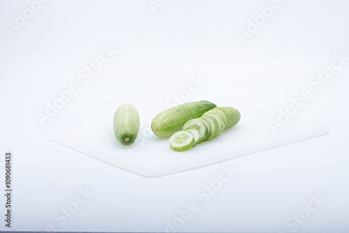 Photo of fresh fruit or vegetables on a light or white background with the freshness of dew