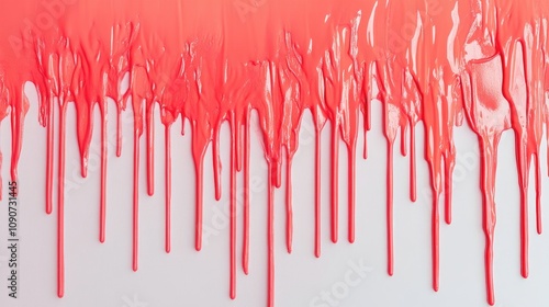 Vivid red paint drips cascading down a stark white background, creating a striking contrast and vibrant visual effect.