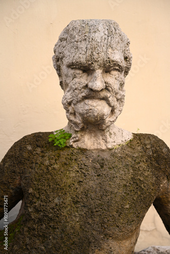 The old sculpture of Babuino fountain (Fontana del Babuino) is situated in via del Babuino in Rome, Italy. The Baboon is one of the talking statues of Rome photo