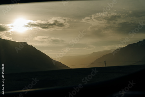 View of Vatnajokull ice cap emerging behind Lomagnupur mountain on the Iceland ring road, route 1 photo