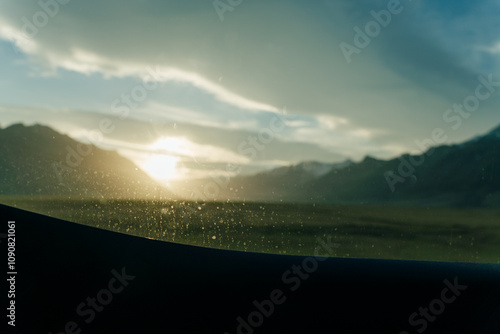 View of Vatnajokull ice cap emerging behind Lomagnupur mountain on the Iceland ring road, route 1 photo