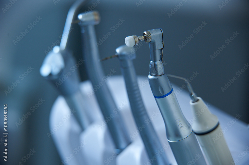 Dental tools arranged for a procedure in a modern clinic setting during daylight hours Dental tools arranged for a procedure in a modern clinic setting during daylight hours