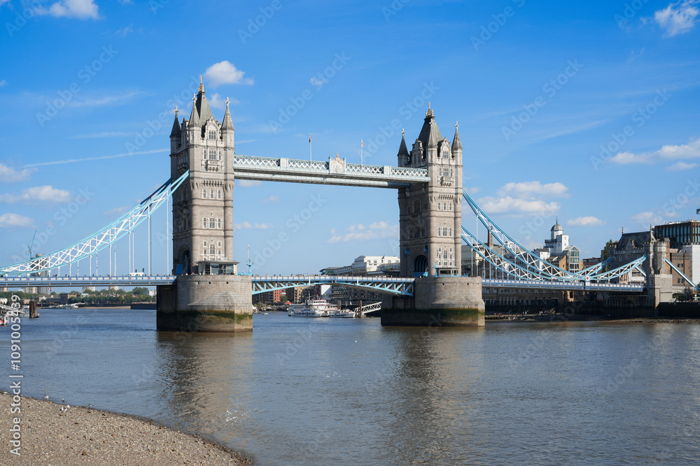 Fototapeta premium Tower Bridge in London, England, UK, is a world-famous landmark and tourist attraction. This iconic bridge spans the River Thames and is a symbol of London