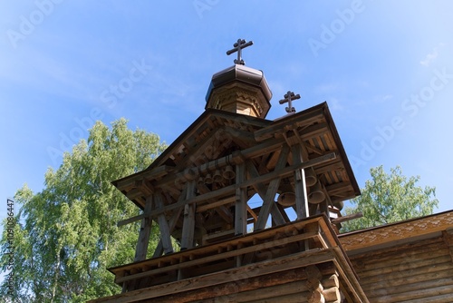  Mandrogi, Russia, July 11, 2024. View from below of the church bell tower.                              