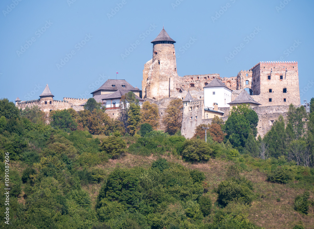 Ľubovnian Castle is a castle in the north of Slovakia, towering above the town of Stará Ľubovňa. The castle was created as a border guard castle that protects trade routes to Poland. Ľubovnian Castle is a castle in the north of Slovakia, towering above the town of Stará Ľubovňa. The castle was created as a border guard castle that protects trade routes to Poland.