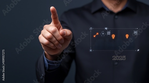 2025 business analytics concept. A person in a dark shirt points at a digital interface showcasing icons and graphs, symbolizing technology and innovation.