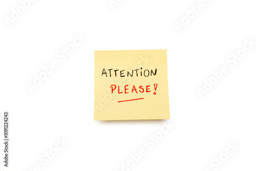 Attention please handwritten on a yellow sticky paper on a white background with copy space