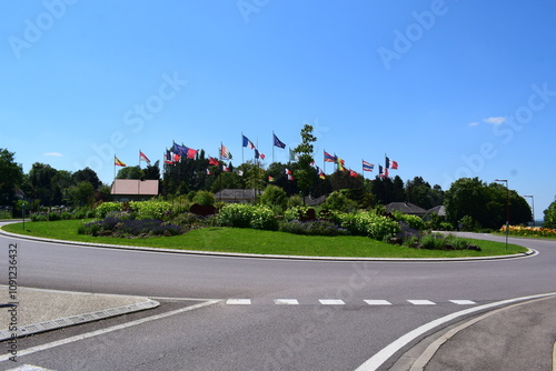 Flags on a traffic circle photo