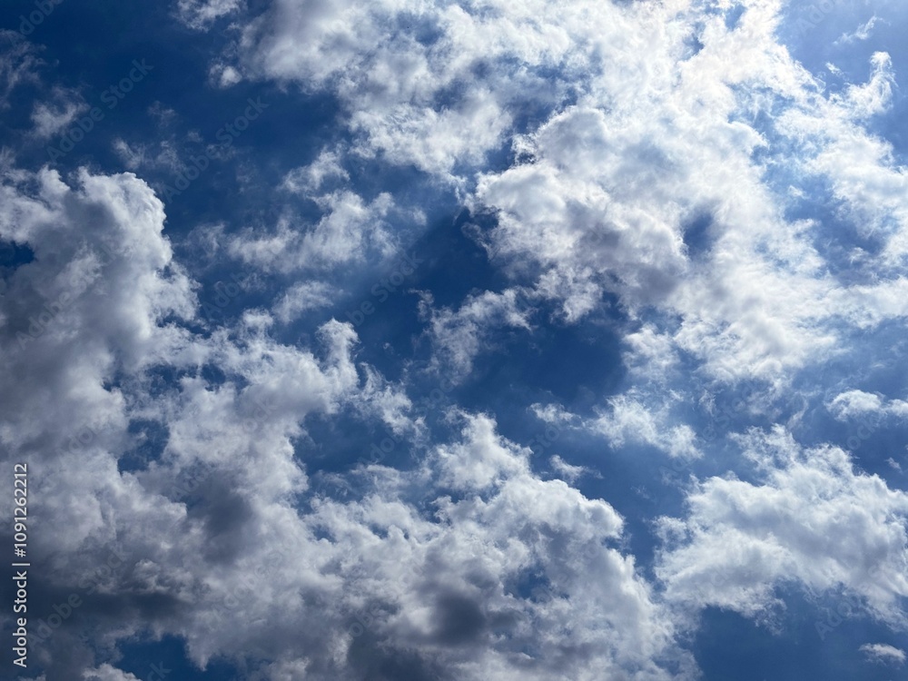 Obraz premium Fluffy clouds in the sky