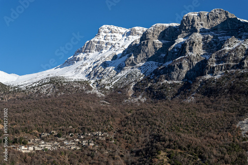 Snowy landscape of Tymfi mountain near the village of Mikro Papigo at the area of Zagori, Epirus, Greece photo