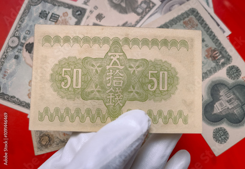 Back view of a 1938 Japanese 50 cent Showa era banknote. photo